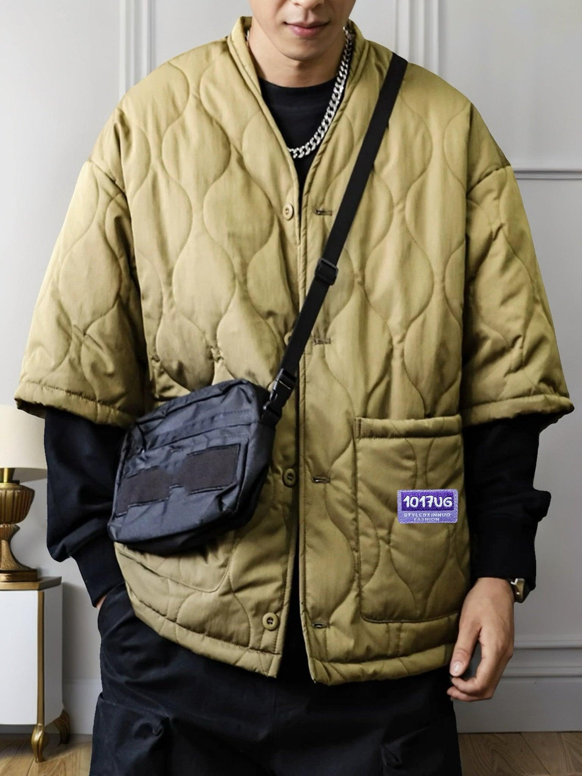 Men's quilted cotton jacket in khaki, button-front with two front pockets and logo patch