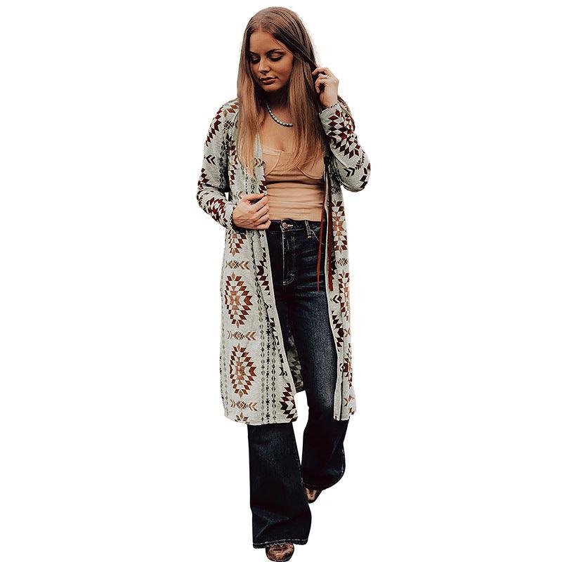 Open-front long cardigan with geometric knit pattern in cream and red with dark details