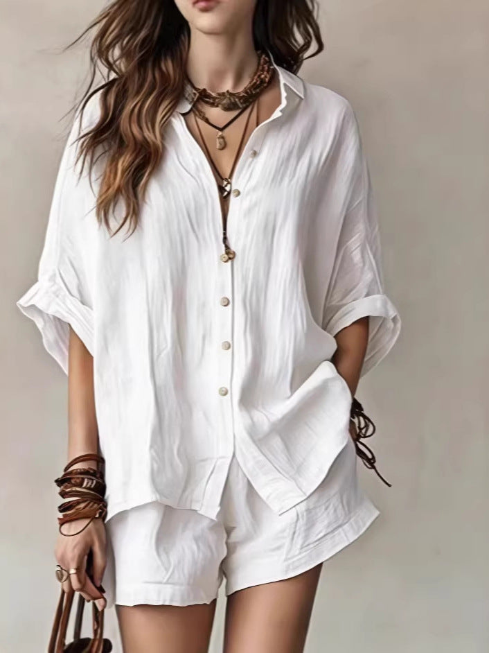 Women’s white button-front short-set with short sleeves and matching elastic-waist shorts