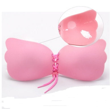 Pink strapless bra with molded cups and lace-up front tie