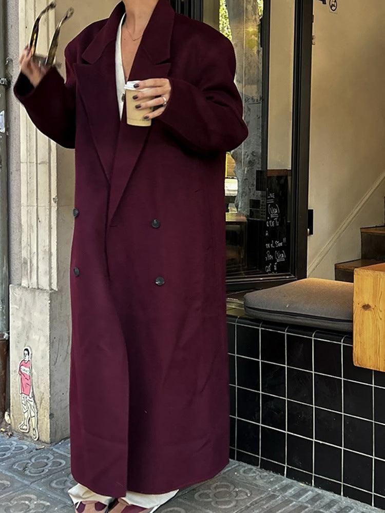 Wine red long blazer with notch lapels, double-breasted buttons, and full sleeves