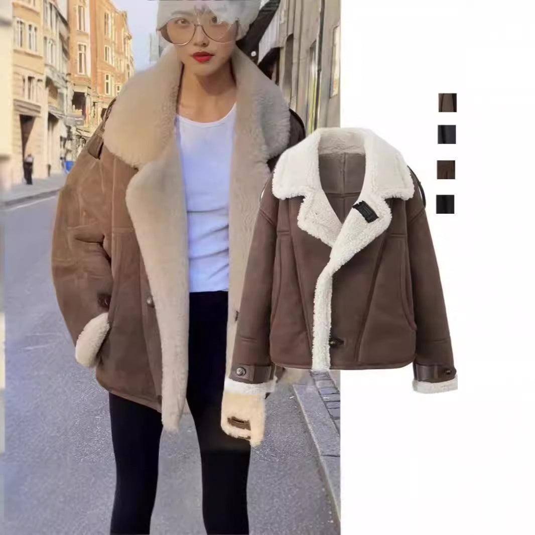 Sherpa-lined brown shearling jacket with button front and plush collar