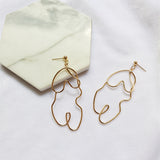 Exaggerated twisted body earrings - WOMONA.COM