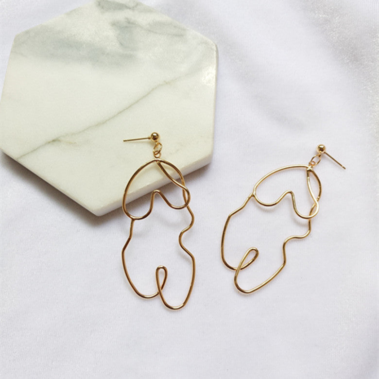 Exaggerated twisted body earrings - WOMONA.COM