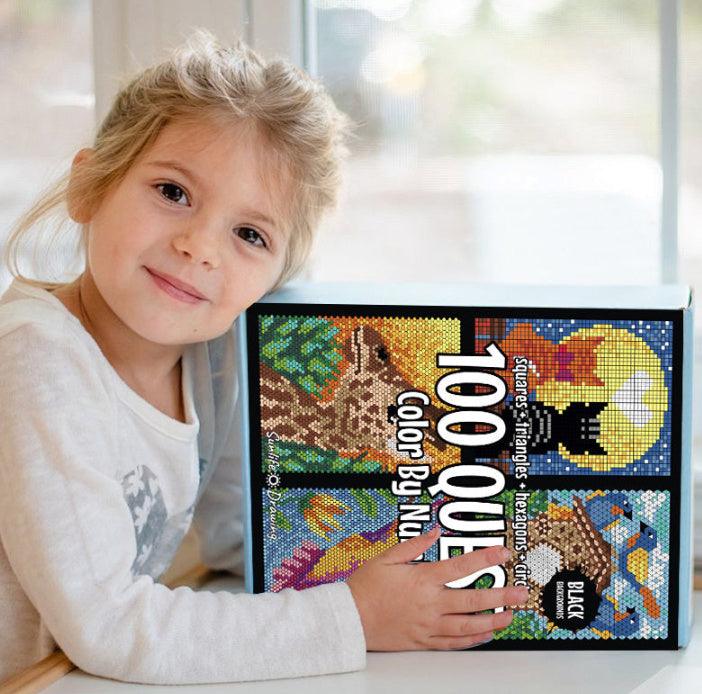 Color-by-number activity book set box with colorful mosaic cover, held by a child