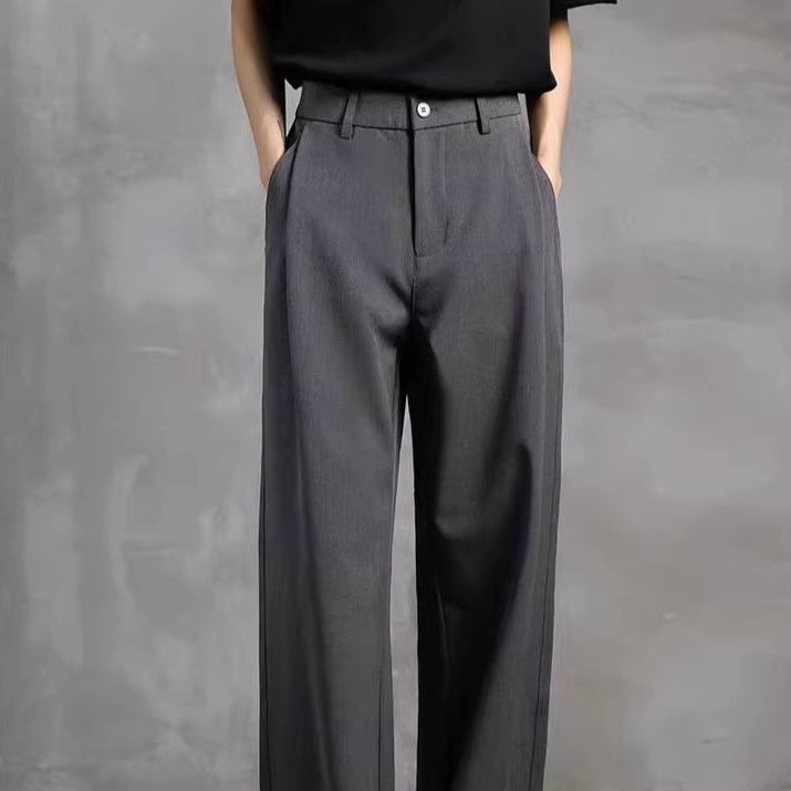 Men's dark gray suit pants with button waistband and belt loops