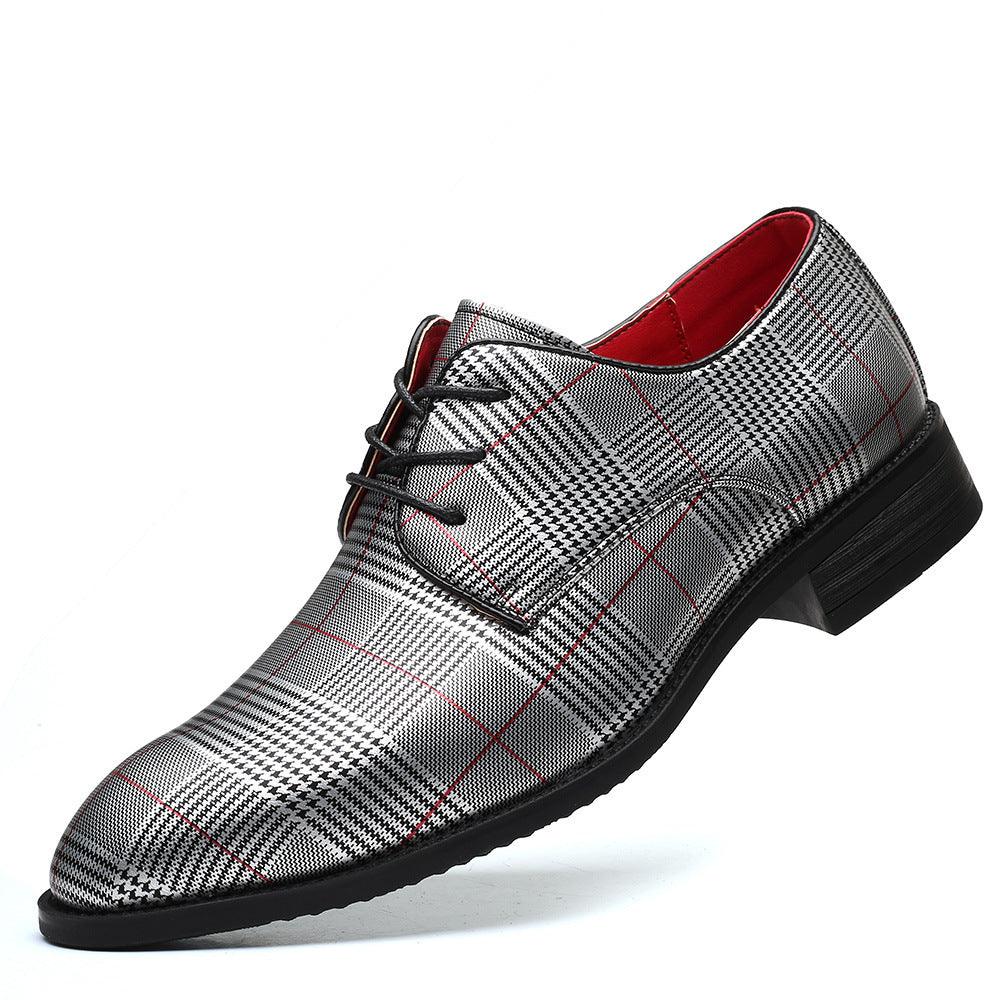 Plaid leather lace-up shoes with red lining and black sole, shown at front angle