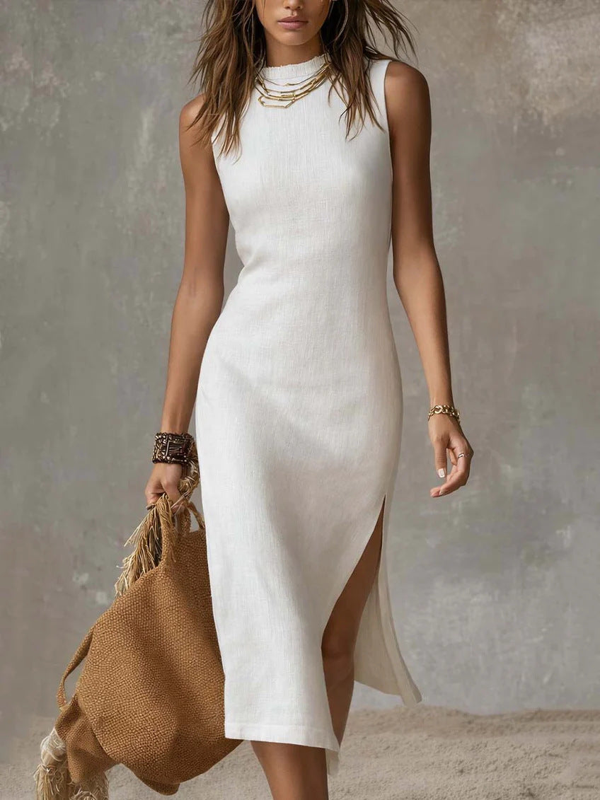 White sleeveless knit midi dress with high neck and side slit