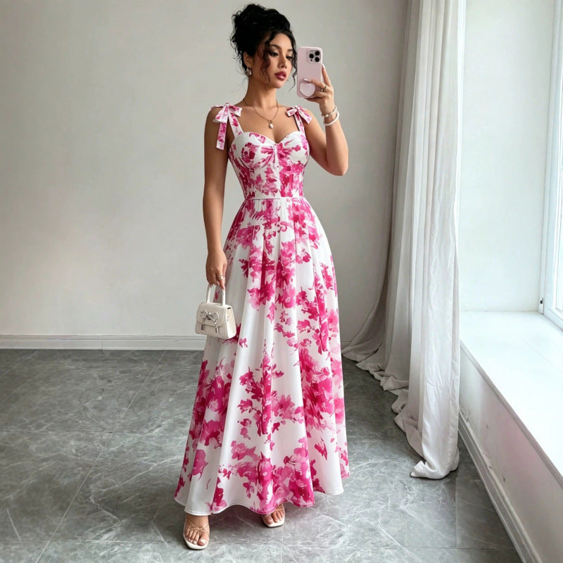 Floral strap maxi dress with pink blooms on white, bow-tie shoulders and sweetheart neckline