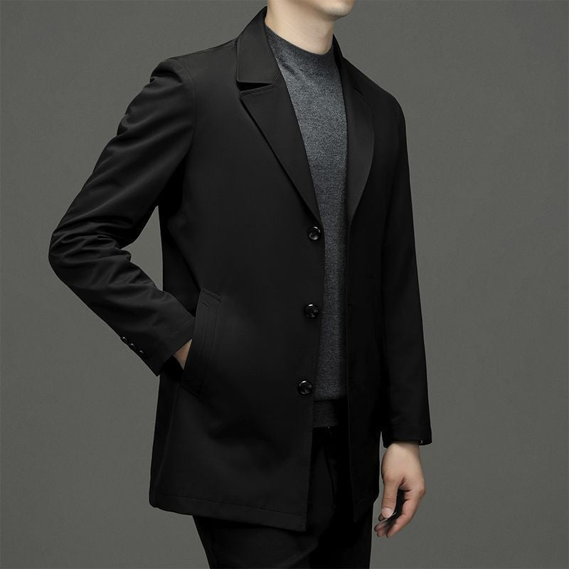 Men's mid-length oversized coat in black with notched lapels and four-button front
