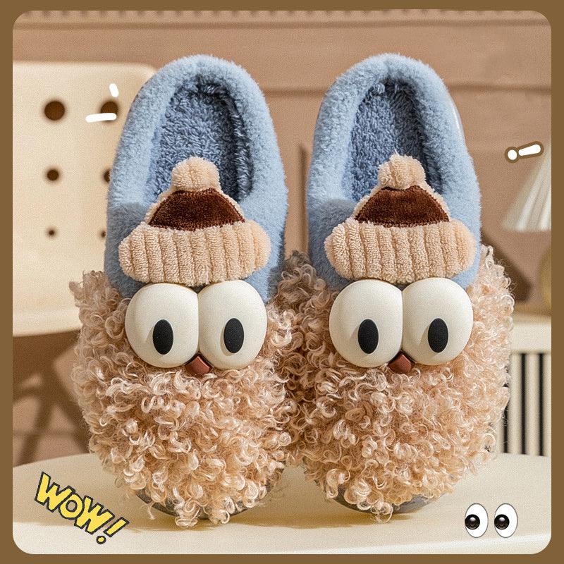 Cartoon bearded Santa slippers with blue fuzzy uppers, brown hat, and tan curly beard.