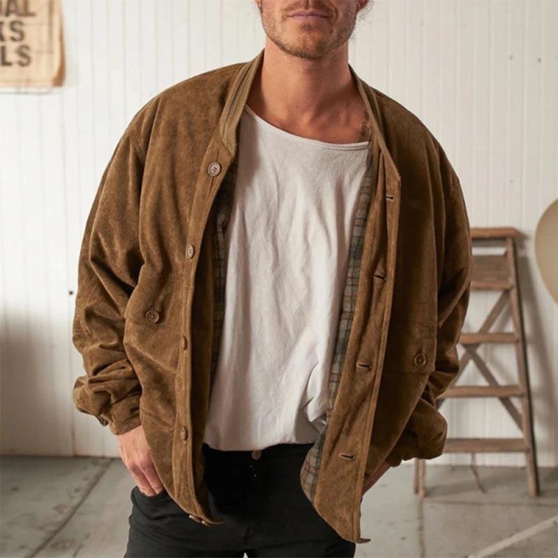 Dark brown men's jacket with button-front, open collar, and long sleeves over a white tee