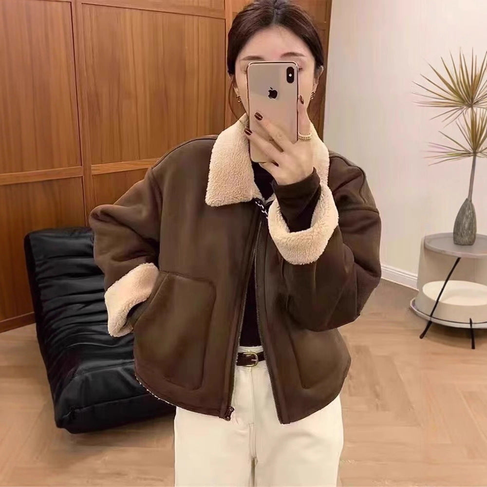 Brown short zip-up motorcycle jacket with sherpa-lined collar and stand-up lapels