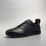 Zapatos casuales sencillos de cuero genuino para hombre hechos de piel de vaca negra