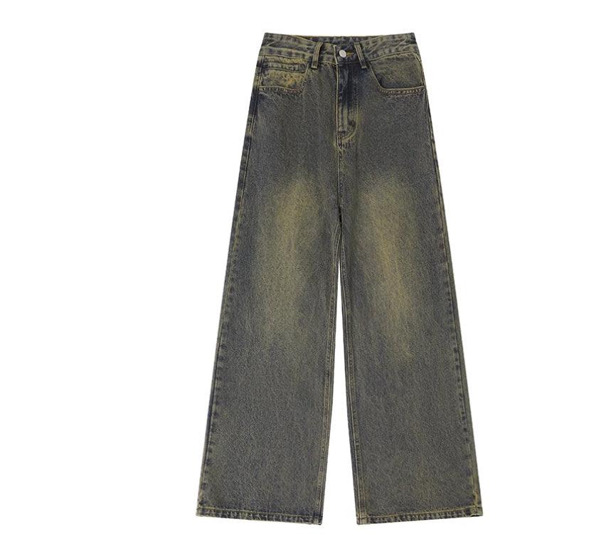 Nostalgic yellow distressed denim wide-leg jeans with button waist and flap pockets
