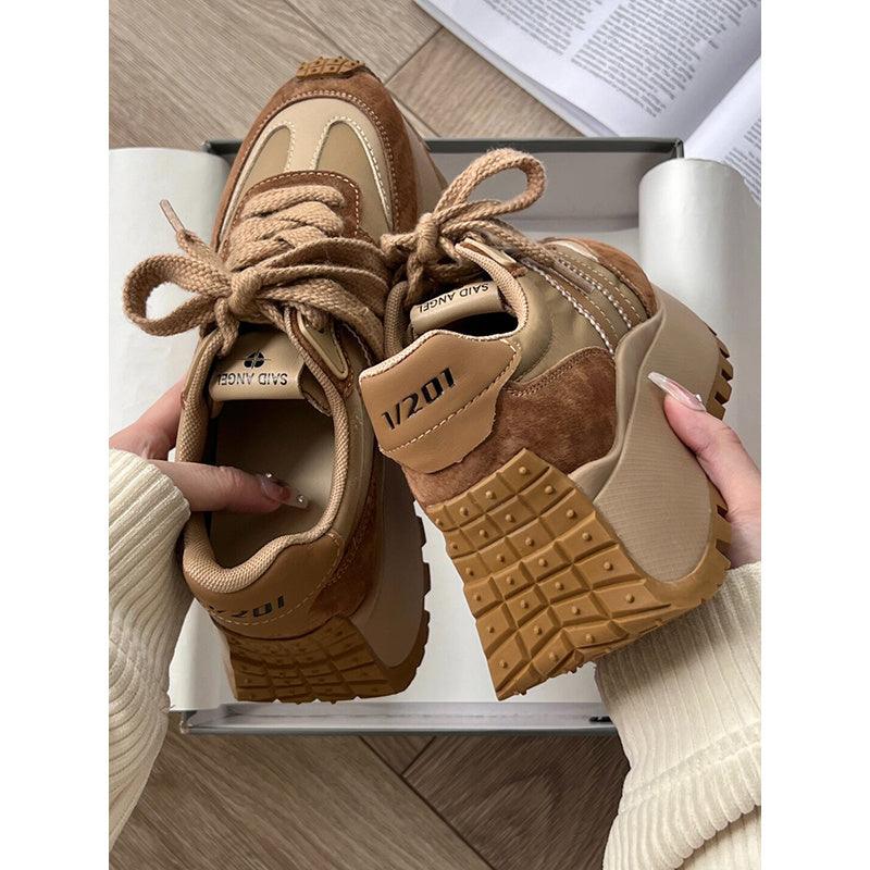 Khaki brown lace-up platform sneakers with suede panels and deep lug tread