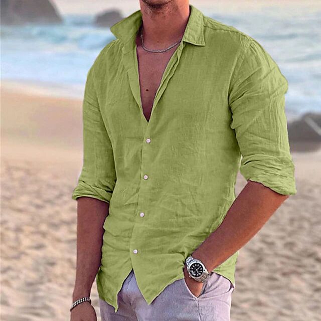 Green button-up shirt with pointed collar and button placket