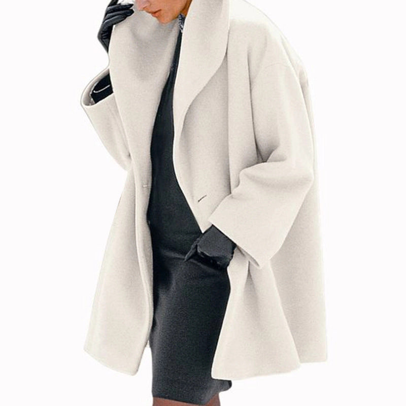 Plus-size button-front coat in white, notched lapel, long sleeves, hip length