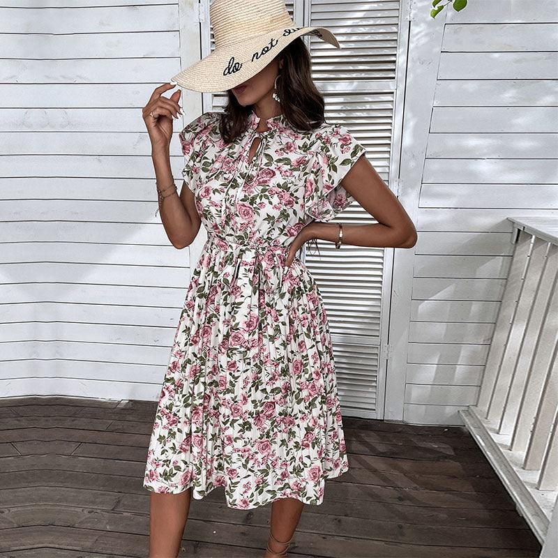 Floral midi dress with ruffled cap sleeves and gathered waist, white rose print