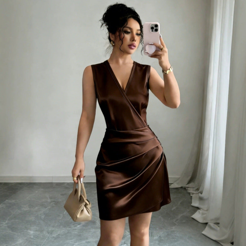 Brown V-neck sleeveless waist-cinching dress with draped wrap front