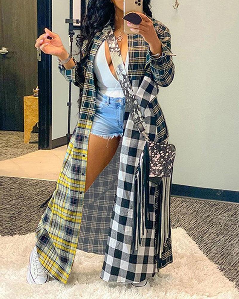 Long open-front plaid coat with fringed hem, yellow, black, and white checks.