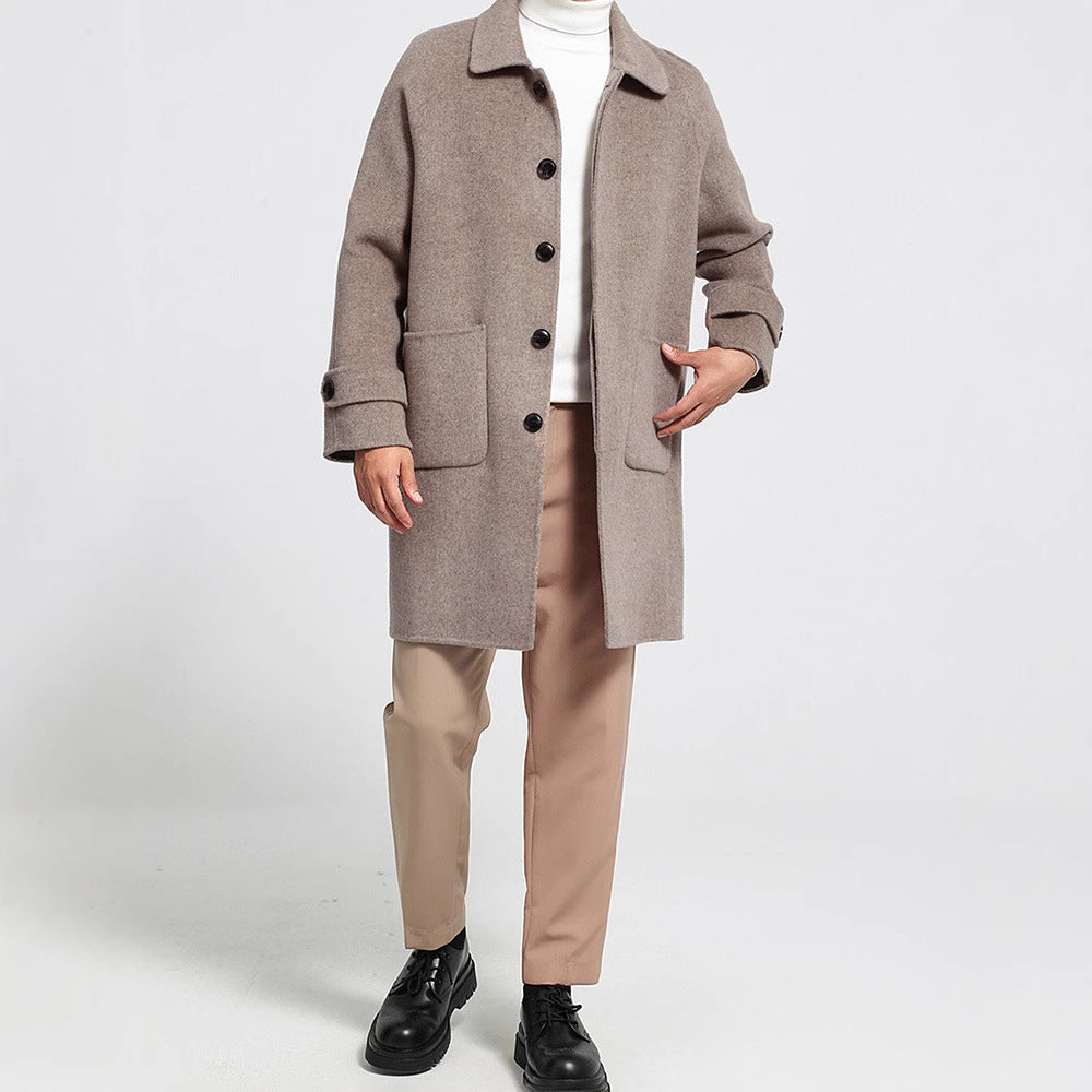 Men's reversible wool coat in dark tan/beige, button front, flap pockets, mid-calf.
