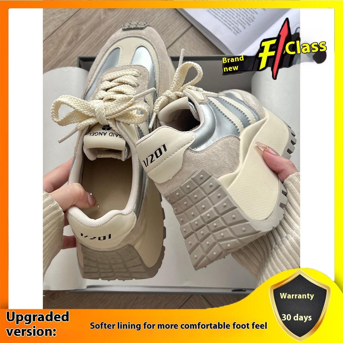 Light silver and white lace-up platform sneakers with blue stripe detail and lug sole