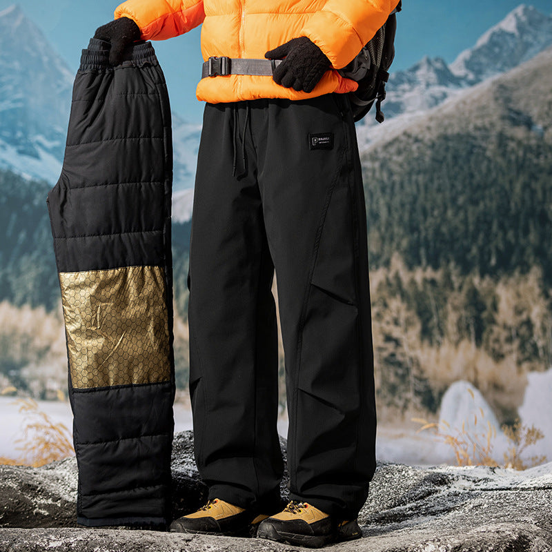 Black insulated pants with drawstring waist and pocket detail on the leg