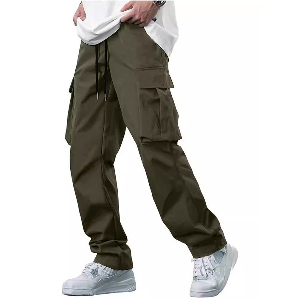 Men’s cargo drawstring pants in olive khaki with flap cargo pockets and drawstring.