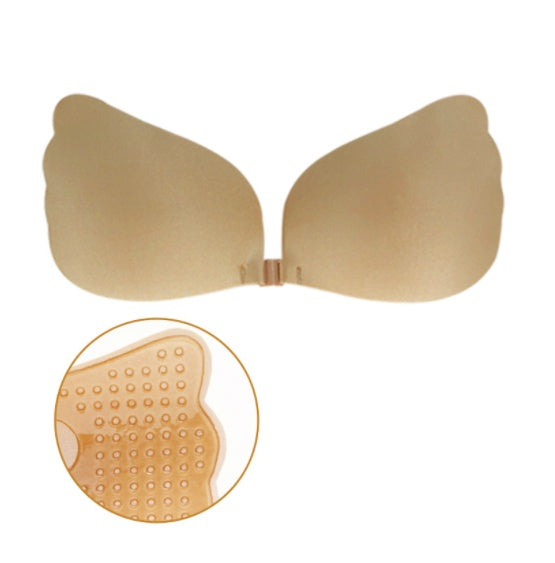Tan nude strapless bra with curved cups and hook-and-loop back closure