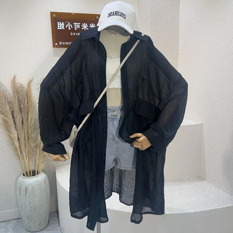 Women's summer long-sleeve sun shirt in black, loose button-front with wide sleeves