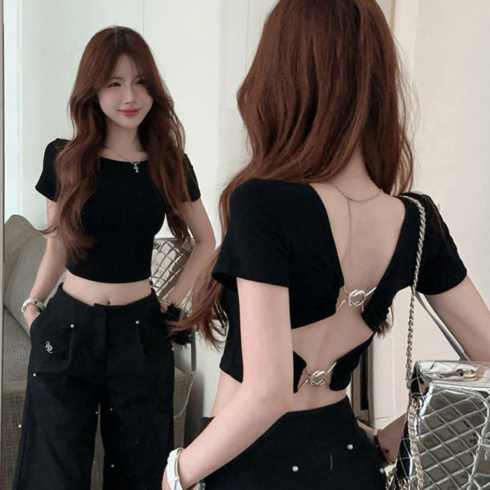 Backless black T-shirt showing open back with metal-ring strap closures