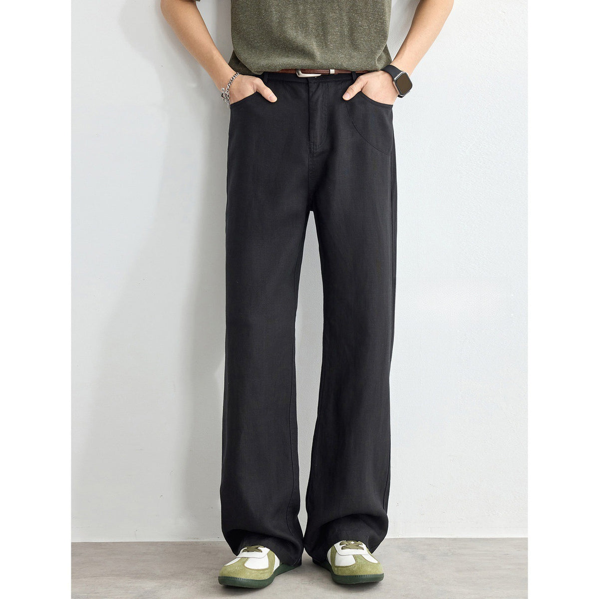 Black straight-leg linen blend pants with relaxed fit, belt loops, and front pockets