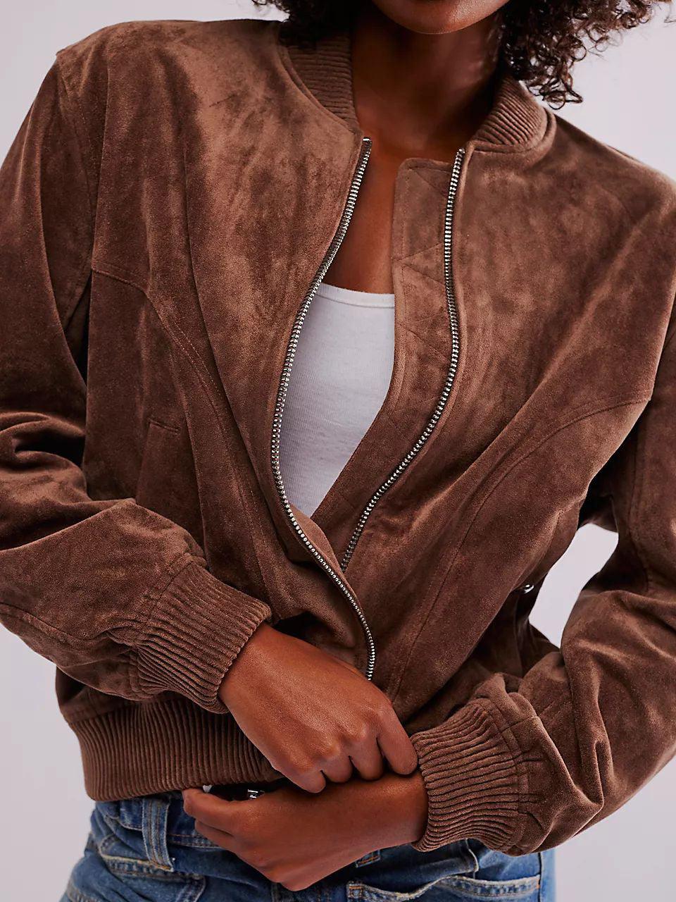 Brown suede zip-up jacket with ribbed cuffs and hem, stand collar, two front pockets.