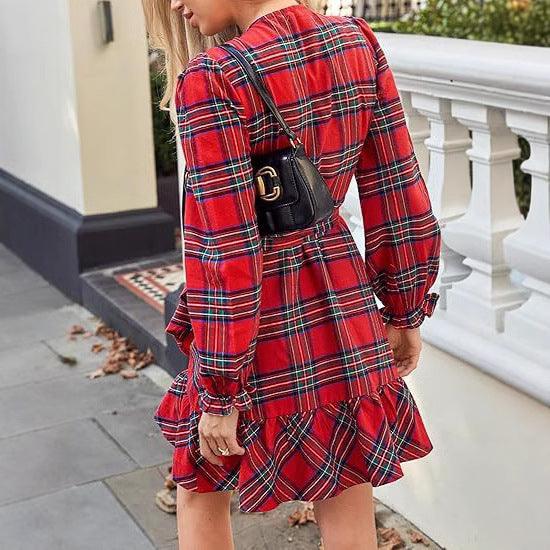 Wine red plaid puff-sleeve dress with drawstring waist and ruffled hem, side view