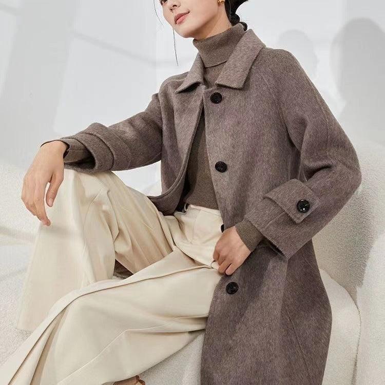 Brown women's wool coat with turn-down collar, single-breasted button front, long length