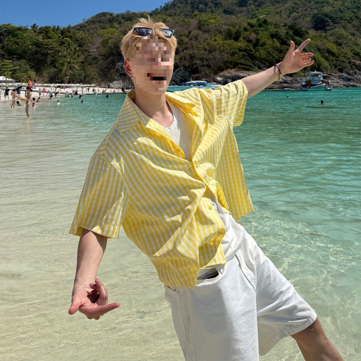 Yellow striped short-sleeve button-front shirt with open collar