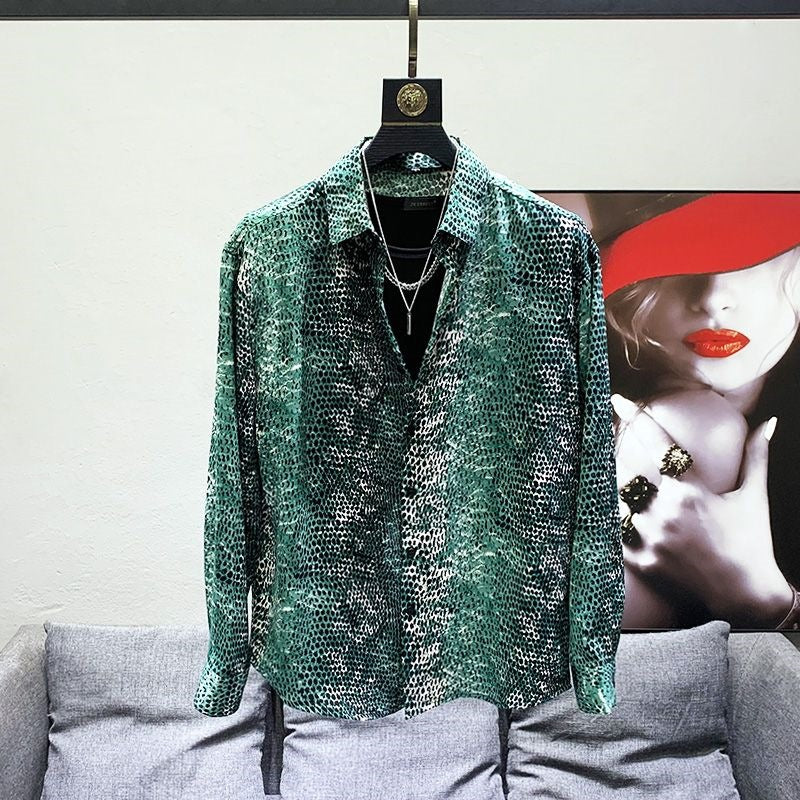 Mens casual snake-skin print shirt in dark green with button-front and pointed collar.