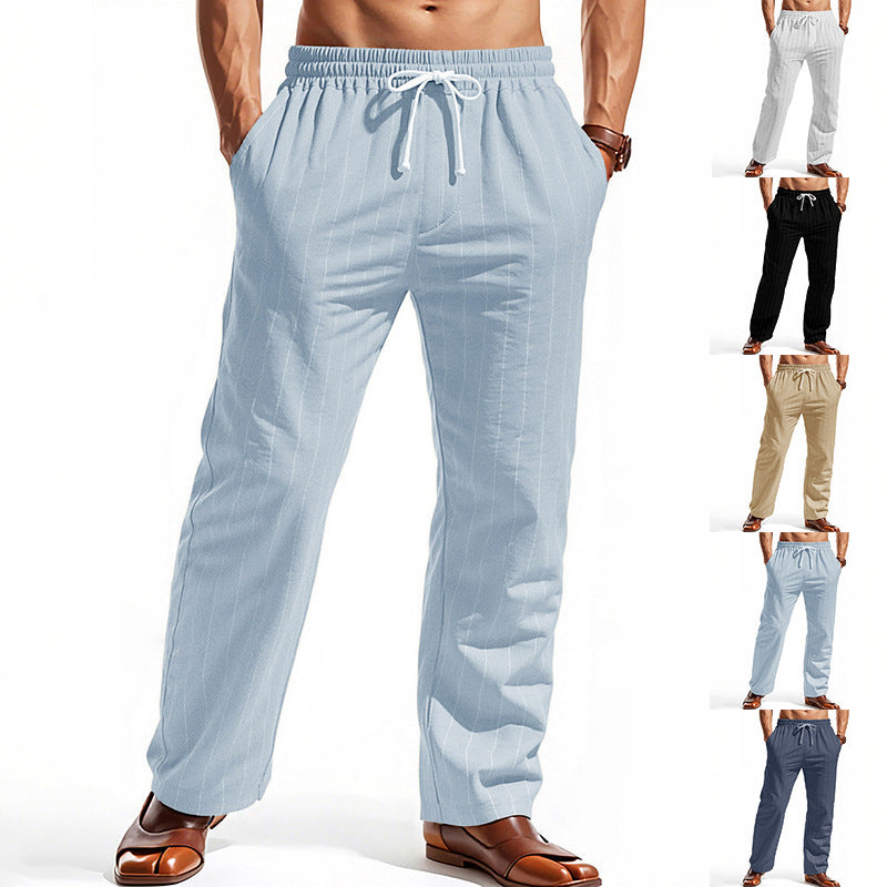 Light blue linen beach shorts with vertical stripes, drawstring waist, straight legs