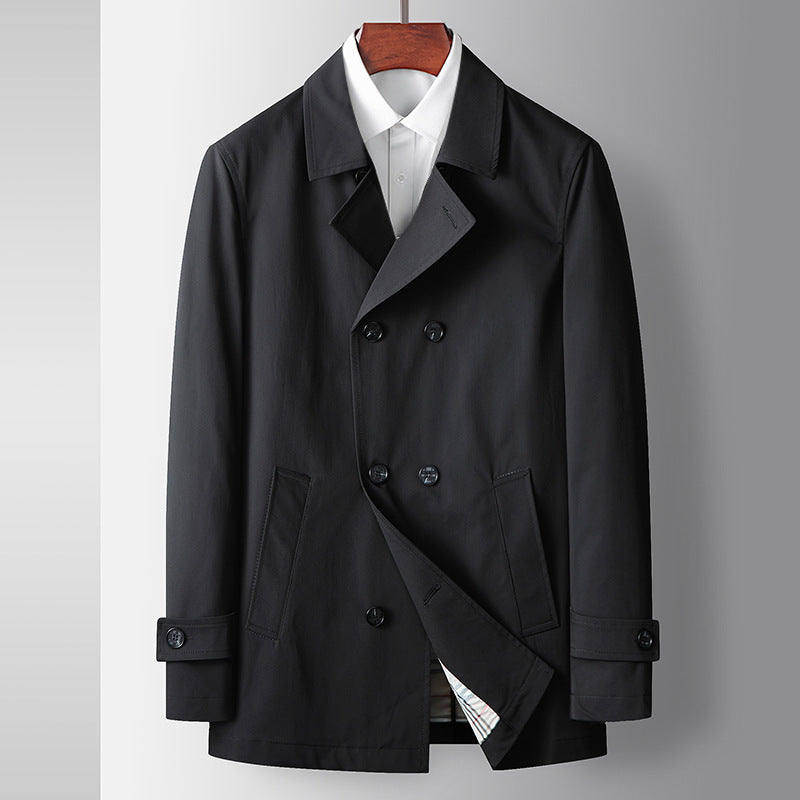 Black trench coat front view with double-breasted buttons and angled flap pockets