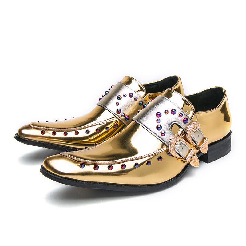 Men's gold metallic loafers with jeweled stud trim and side buckle strap, angled pair