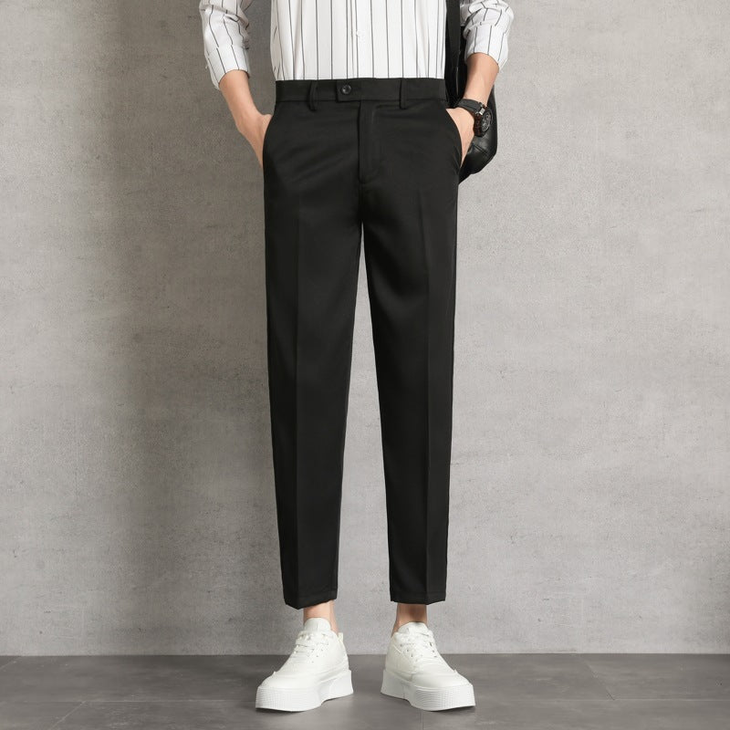 Men’s high-waisted straight trousers in black with belt loops and front pleats