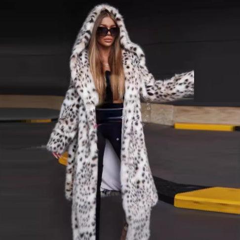 Leopard-print faux fur long coat with hood, open front, modeled over dark pants.
