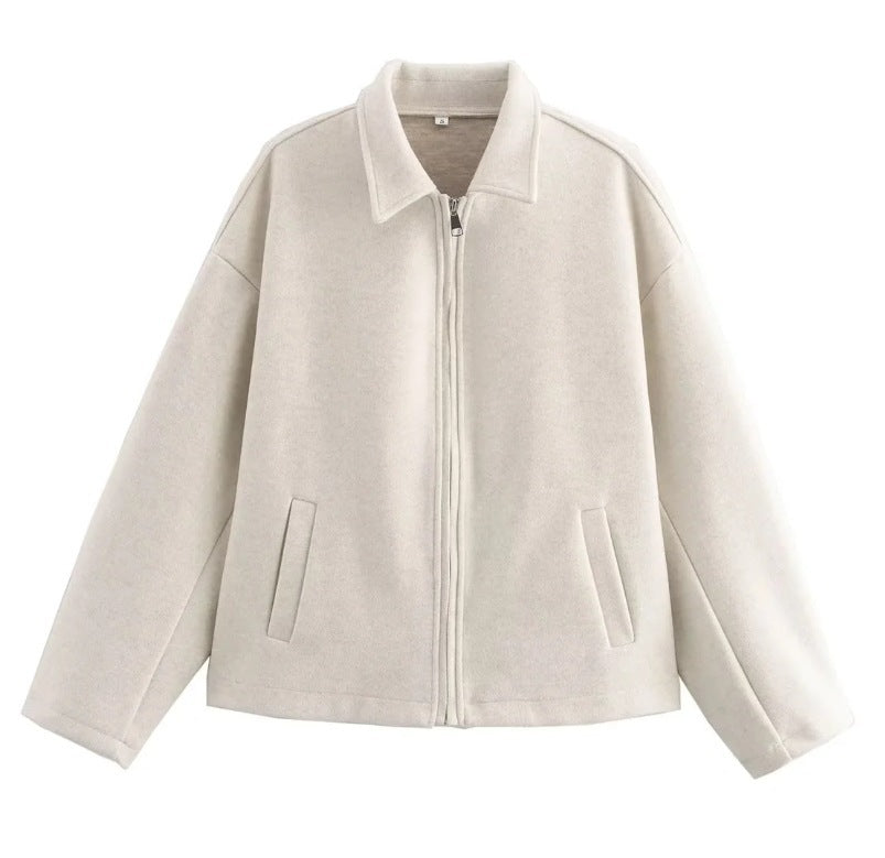 Women's loose casual cream zip-front jacket with flap collar and side pockets.