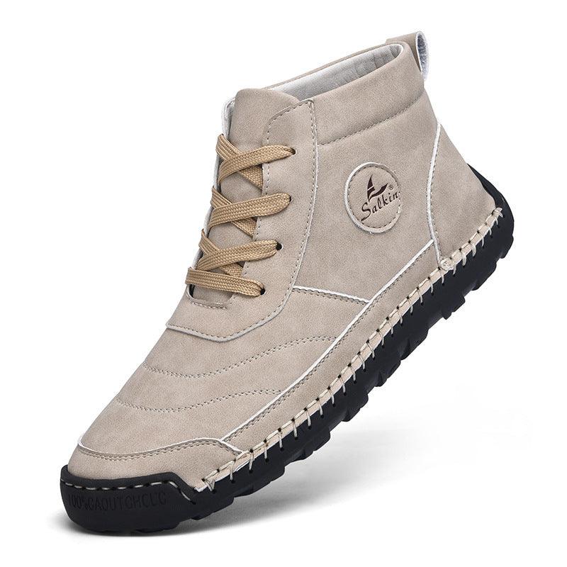 Beige suede lace-up high-top shoes with tan laces, side stitch lines, and textured sole