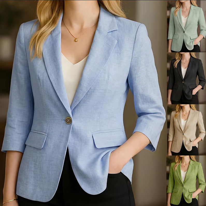 Women’s light blue blazer jacket with notched lapel, button front, and chest pockets