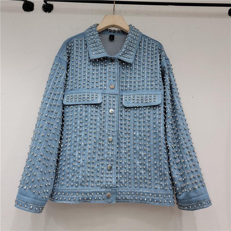 Blue denim jacket with rhinestone-studded full front, chest pockets, and button closure
