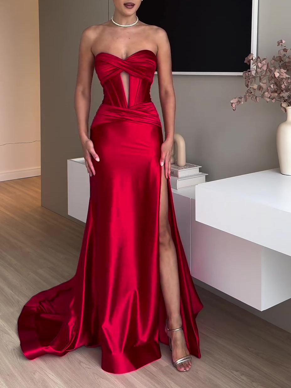 Red strapless evening dress with sweetheart neckline, fitted bodice, thigh-high slit