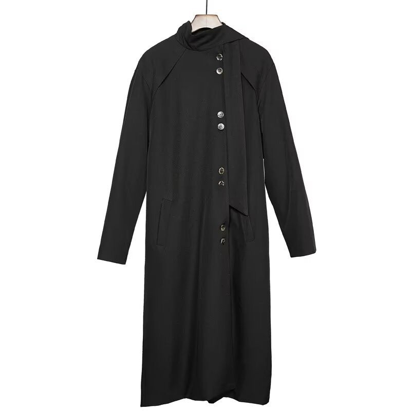 Black long hooded trench coat with layered panels and vertical button placket
