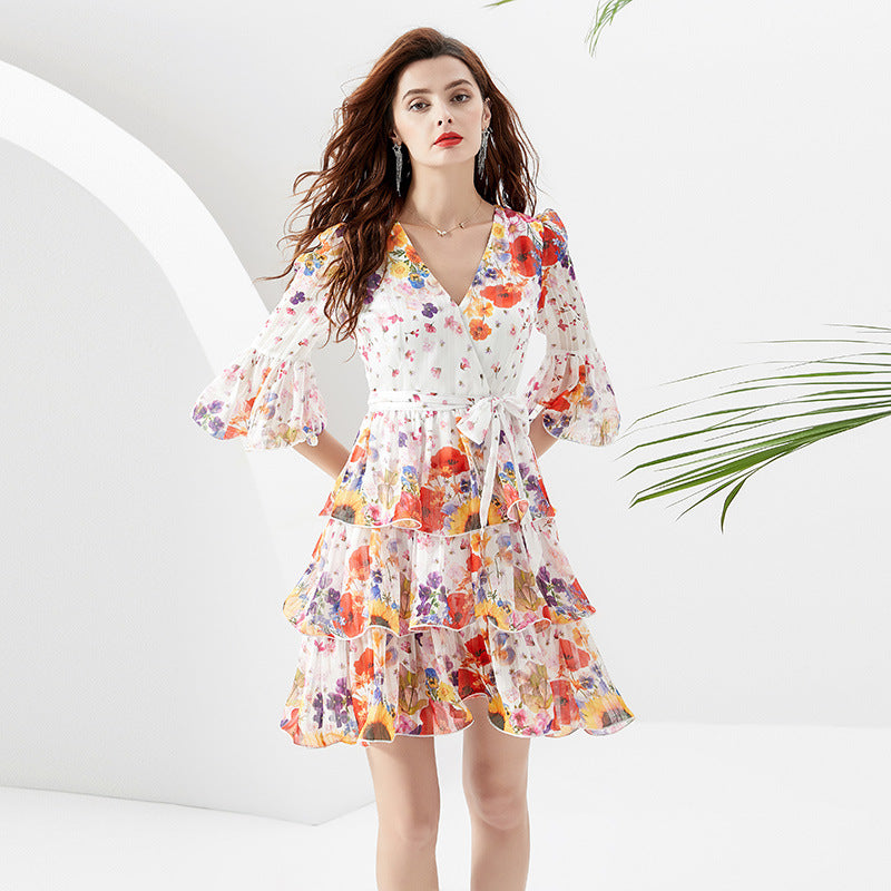 Floral Bell-Sleeve Ruffle Mini Dress — floral bell-sleeve dress standing front